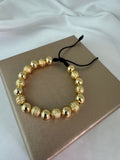 Pulsera oro laminado 18k balín 8mm sobre caja de regalo